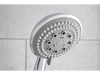 Chrome shower head with multiple spray settings.