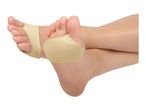 A pair of feet wearing beige forefoot cushions, isolated on a white background.