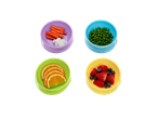 Four bowls with healthy snacks: carrots, peas, oranges, strawberries, and blueberries.