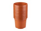 Stack of brown plastic plant pots