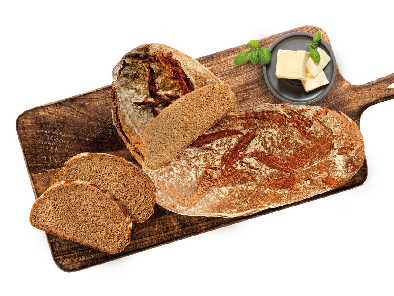 Brot mit Butter auf einem Holzbrett.