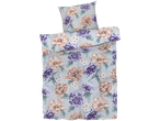 Blommig sängkläder i lila och beige toner.