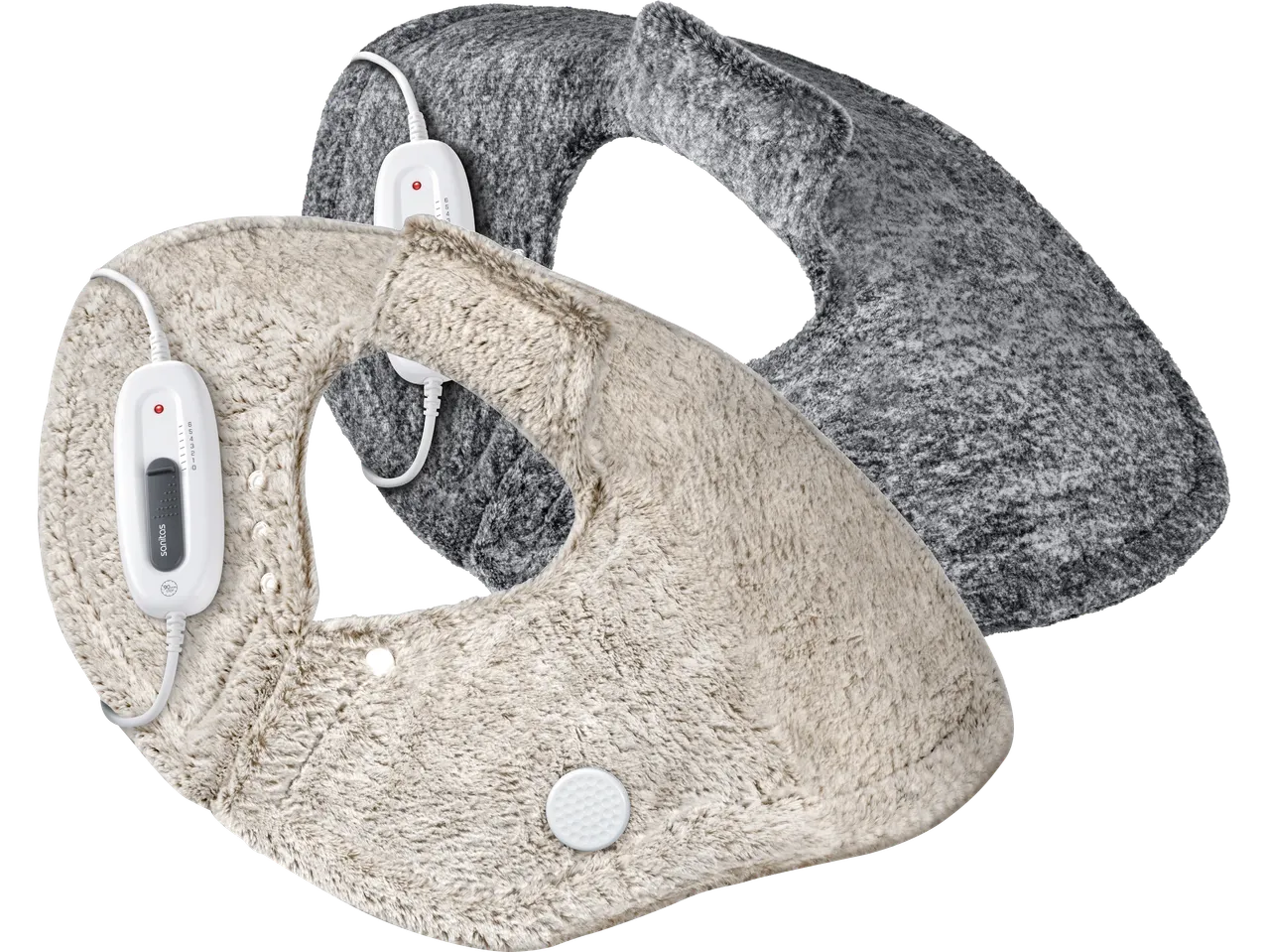 Två elektriska värmedynor i fuskpäls, en beige och en grå, med Sanitas-kontroller.