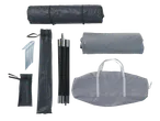 Tent components including rolled tent fabric, poles, stakes, and carry bags.