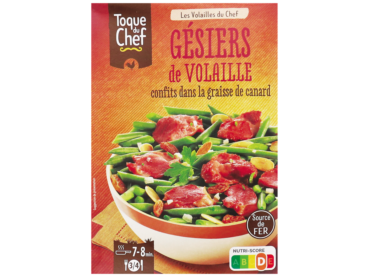 Gésiers de volaille confits dans la graisse de canard avec haricots verts et fruits secs.