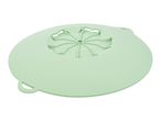 A light green silicone steamer lid with a central vent.