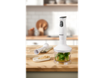 SilverCrest hand blender and food processor with ingredients on a wooden counter.