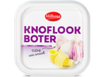 Milbona Knoflookboter met knoflooktenen en boterkrullen, tekst 'Pittig van smaak'