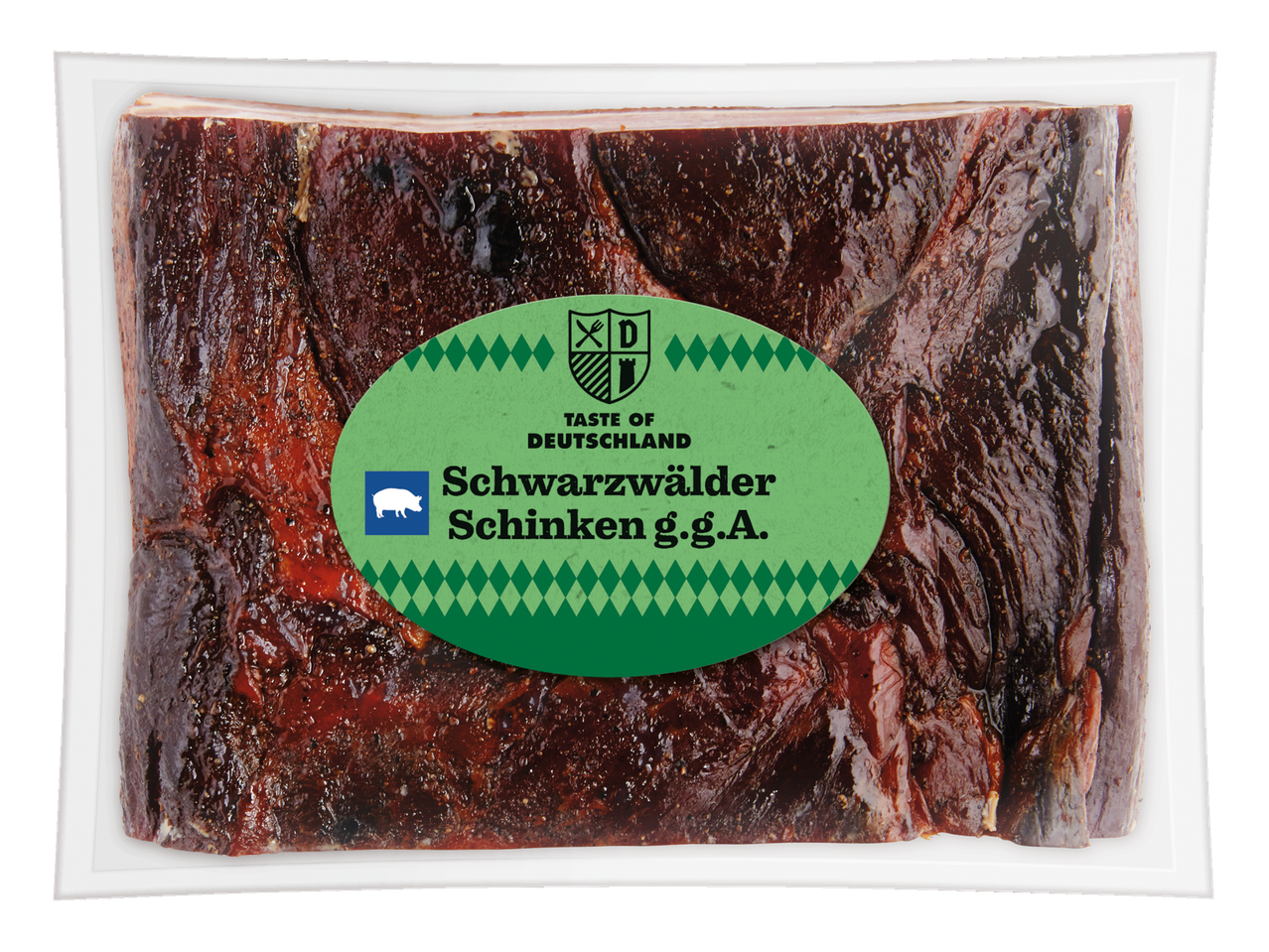 Verpakte Schwarzwälder Schinken met groen etiket, varkensicoon en tekst.