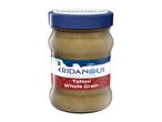 Eridanous Greek Style Tahini Whole Grain in a glass jar with a blue lid