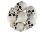 A mesh bag filled with white Halloween skull decorations.