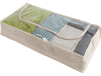 Geantă de depozitare bej cu capac transparent, care arată pături și textile.