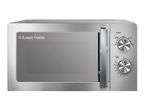 Stainless steel microwave oven with two control dials for power and time settings.