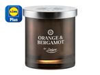 A Lidl Plus branded orange & bergamot scented candle by Deluxe.