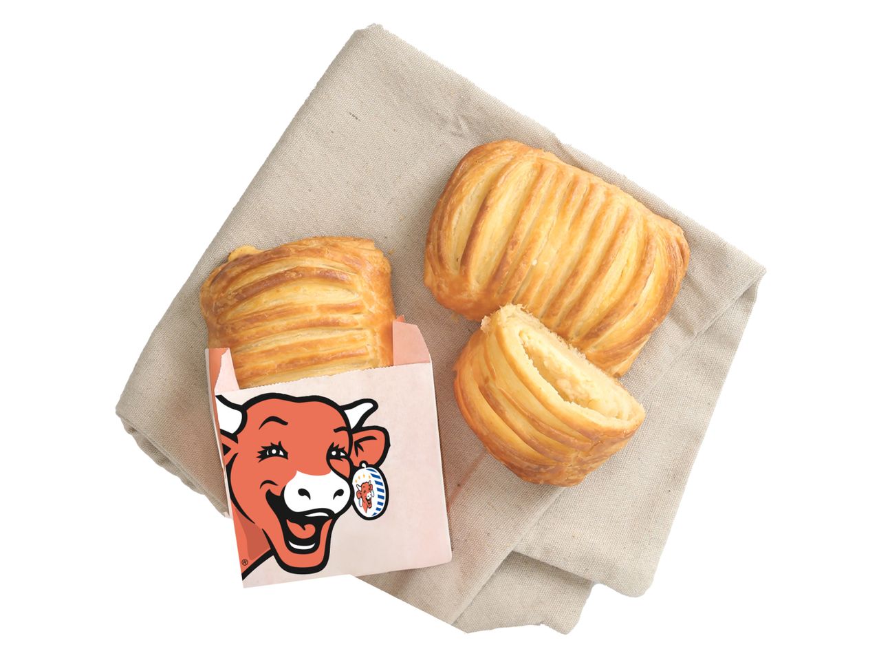 Pâtisseries feuilletées et boîte avec logo de vache joyeuse.