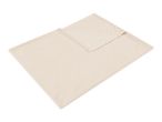 Soft beige fleece blanket with a folded corner