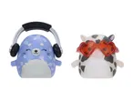 Two squishy toys: a blue one with headphones and a cow-patterned one with heart-shaped glasses.