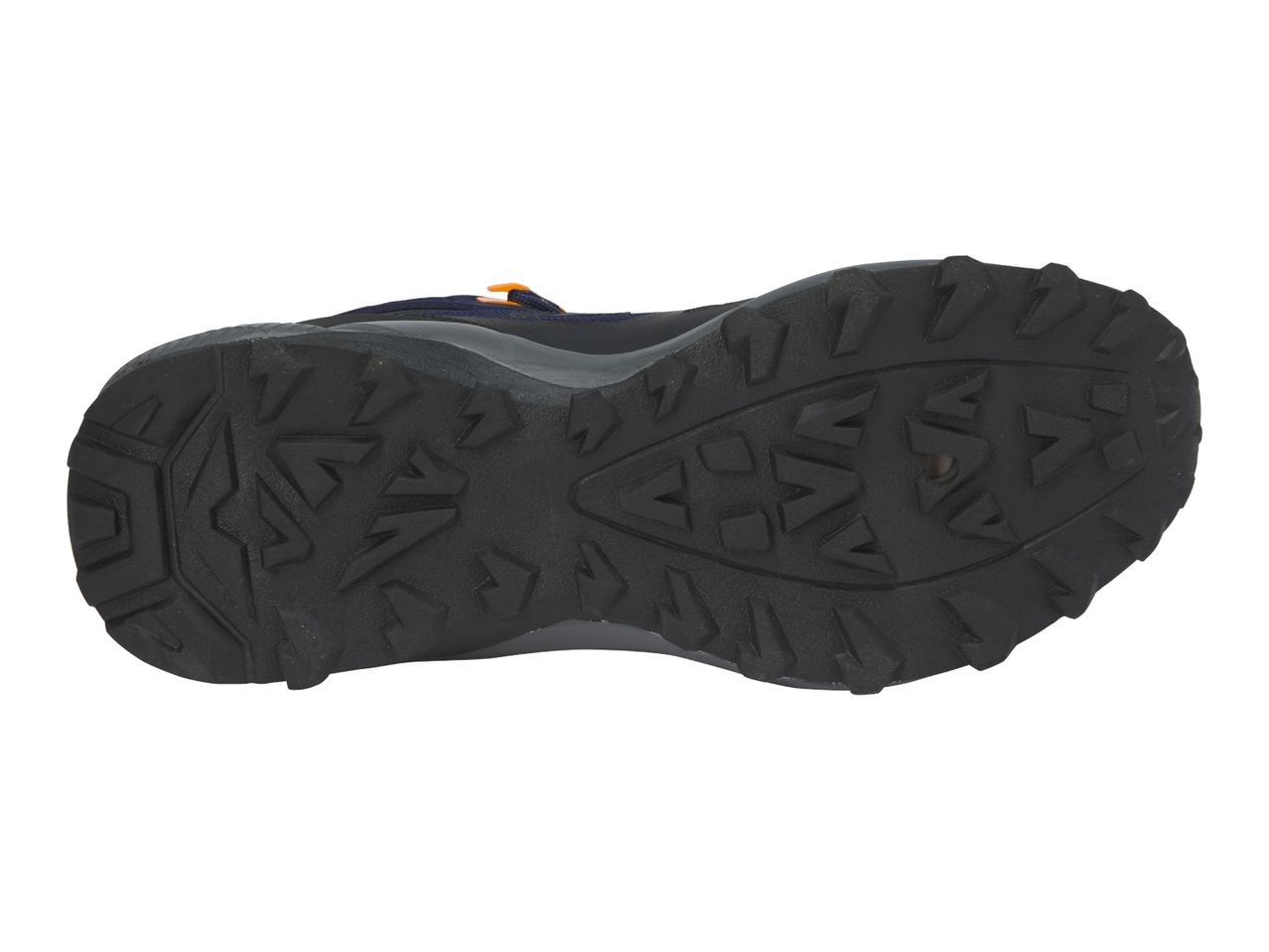 Black textured rubber sole of a hiking shoe