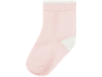 A single pink baby sock with a white cuff.