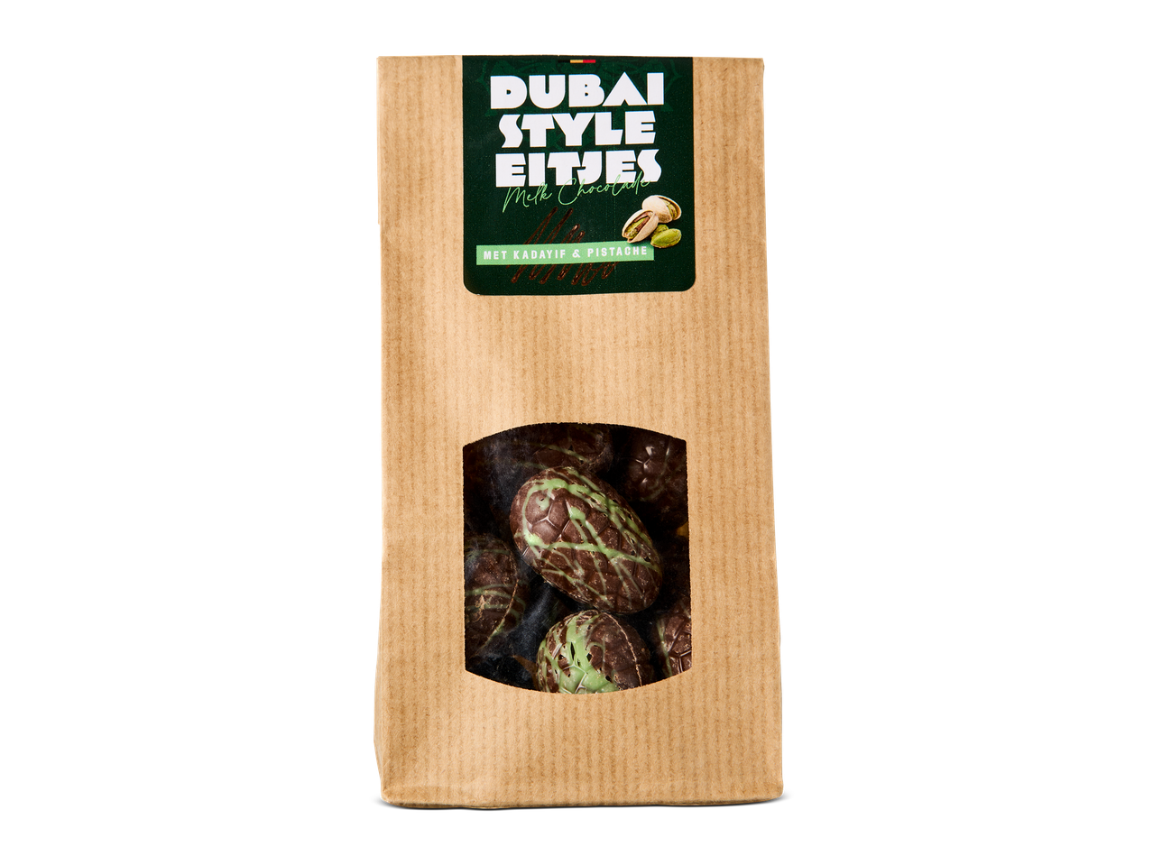Papieren zak met chocolade-eieren met pistache en kadayif, zichtbaar door een venster.