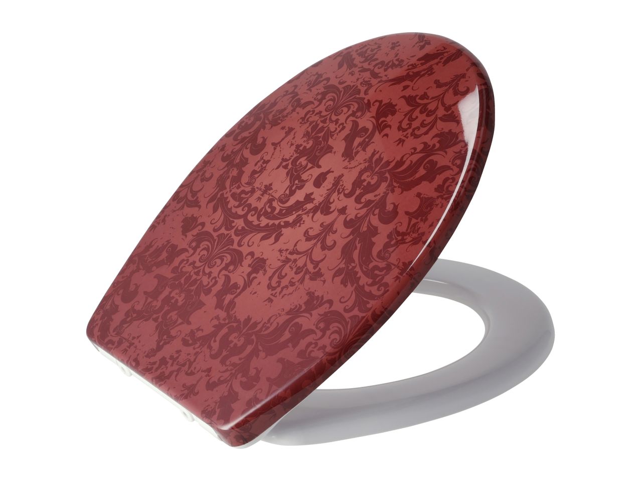 Red toilet seat with an ornate damask pattern, angled on a white background