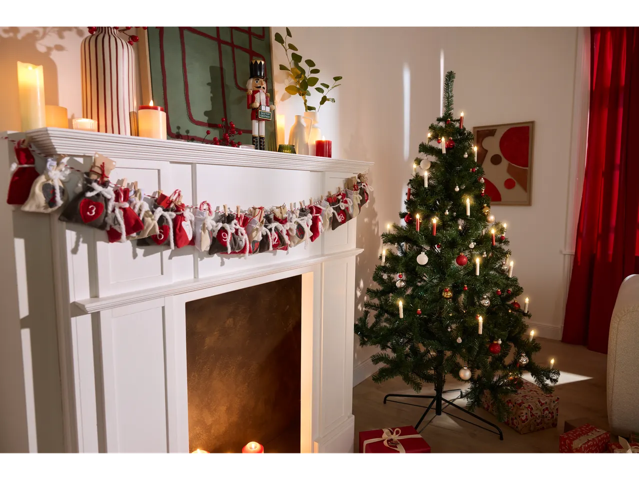 LIVARNO home Wireless LED Christmas Tree Candles on a decorated tree next to a fireplace