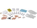 A first aid kit with bandages, gauze, medical tape, scissors, masks, gloves, and an emergency blanket.