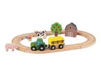 Wooden farm train set with tractor, wagon, animals, tree, and barn on a track.