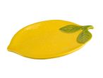 Plat en céramique jaune en forme de citron.