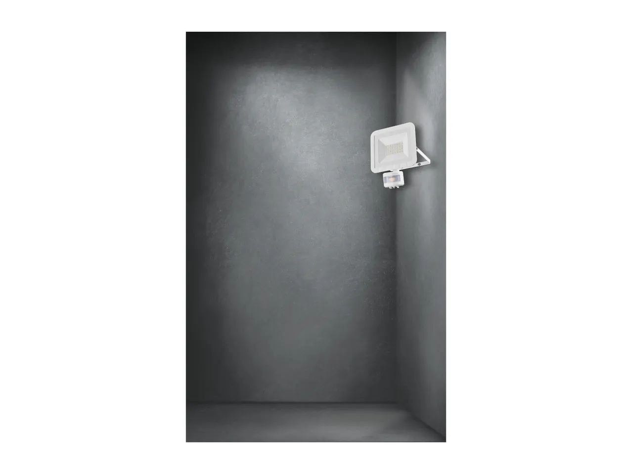 White LED floodlight with motion sensor mounted on a dark gray wall.
