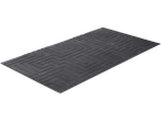 A dark gray rectangular rug with a geometric maze pattern.