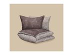 Reversible bedding set with a leaf pattern, featuring a duvet cover and two pillows