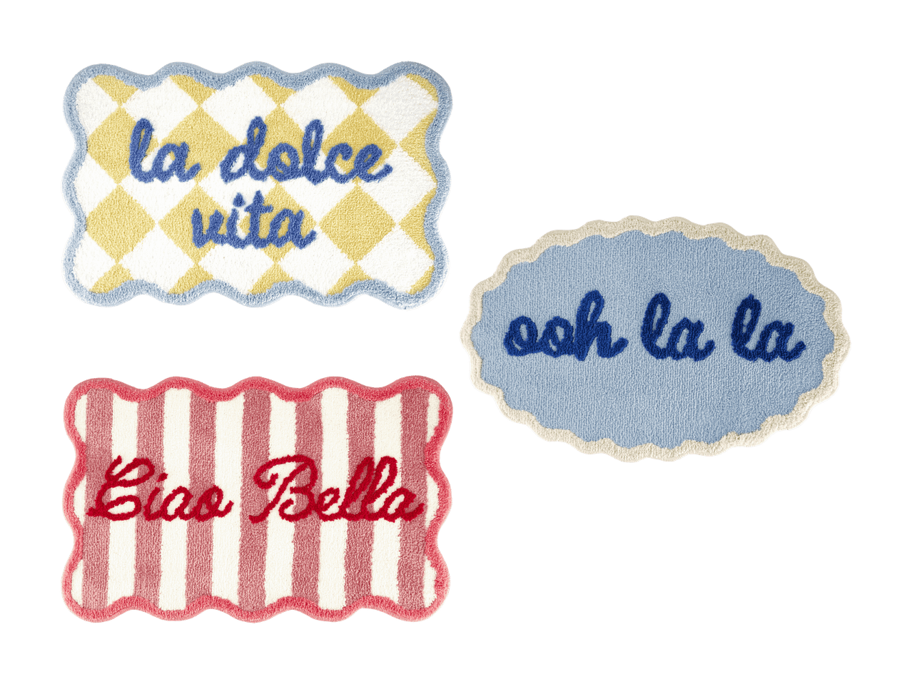 Tre tuftede tæpper med teksterne 'la dolce vita', 'ooh la la' og 'Ciao Bella'.