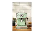 Light green espresso machine with a gauge, two clear cups, and coffee beans on a wooden counter.
