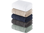 Stack of soft towels in various colors.