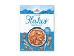 Pakke med special-branflakes med 80% fuldkorn, serveret i en skål med mælk.