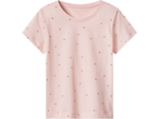 Pink short-sleeved t-shirt with small red polka dots.