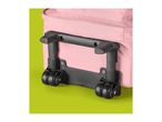 Pink shopping trolley with black wheels and frame on a green background