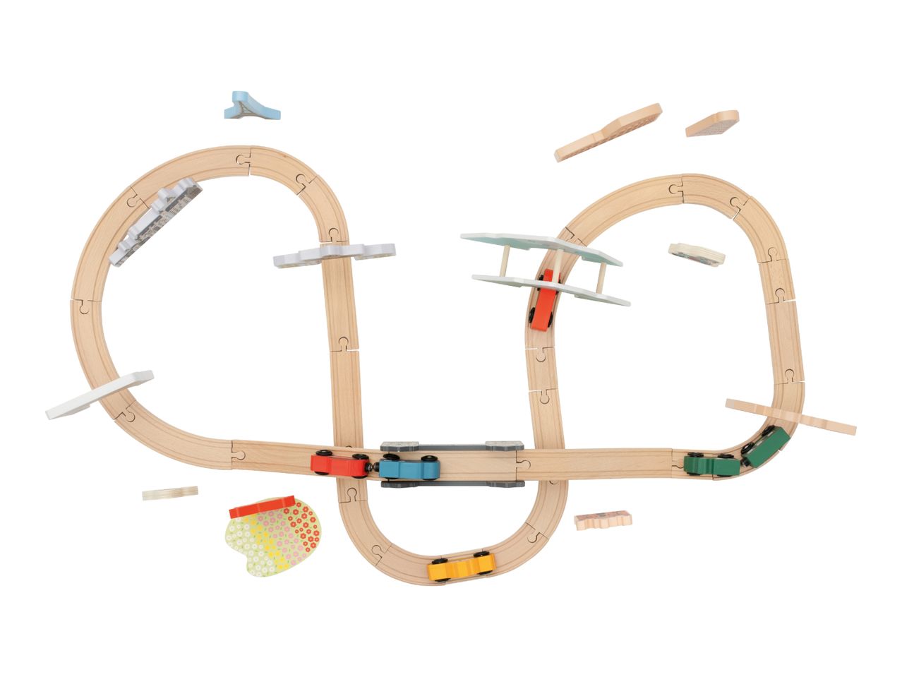 Wooden toy train set with tracks, bridges, and colorful train cars on a white background.
