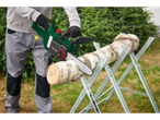 Parkside chainsaw in use, cutting wood on a sawhorse.