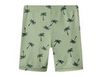 Green swim shorts with a dark palm tree pattern.