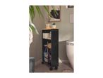 Black bathroom storage trolley with wooden top, holding toiletries and a plant, next to a toilet.