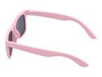 Pink sunglasses with dark lenses, viewed from an angle against a white background.