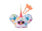 A colorful, fluffy Furby toy with a unicorn horn and a hair clip.