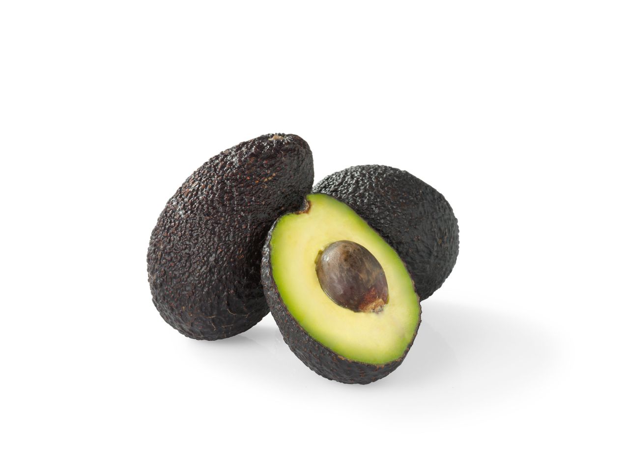 Hete en gehalveerde avocado's.