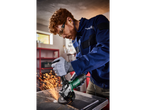 Man using a Parkside angle grinder to work metal.