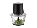 Must elektriline hakkija klaaskausiga, täidetud värske peterselliga.
