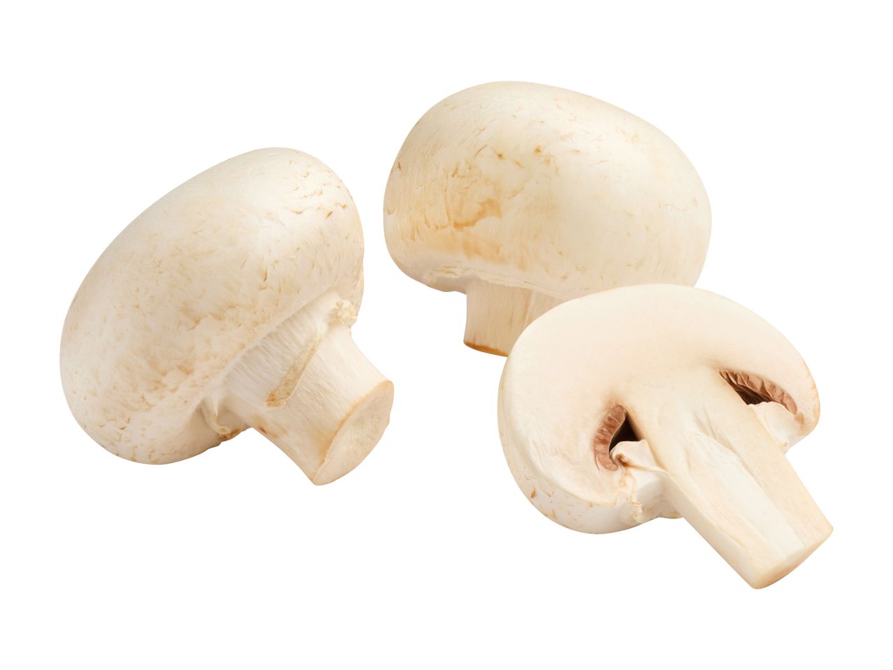 Whole and sliced button mushrooms.