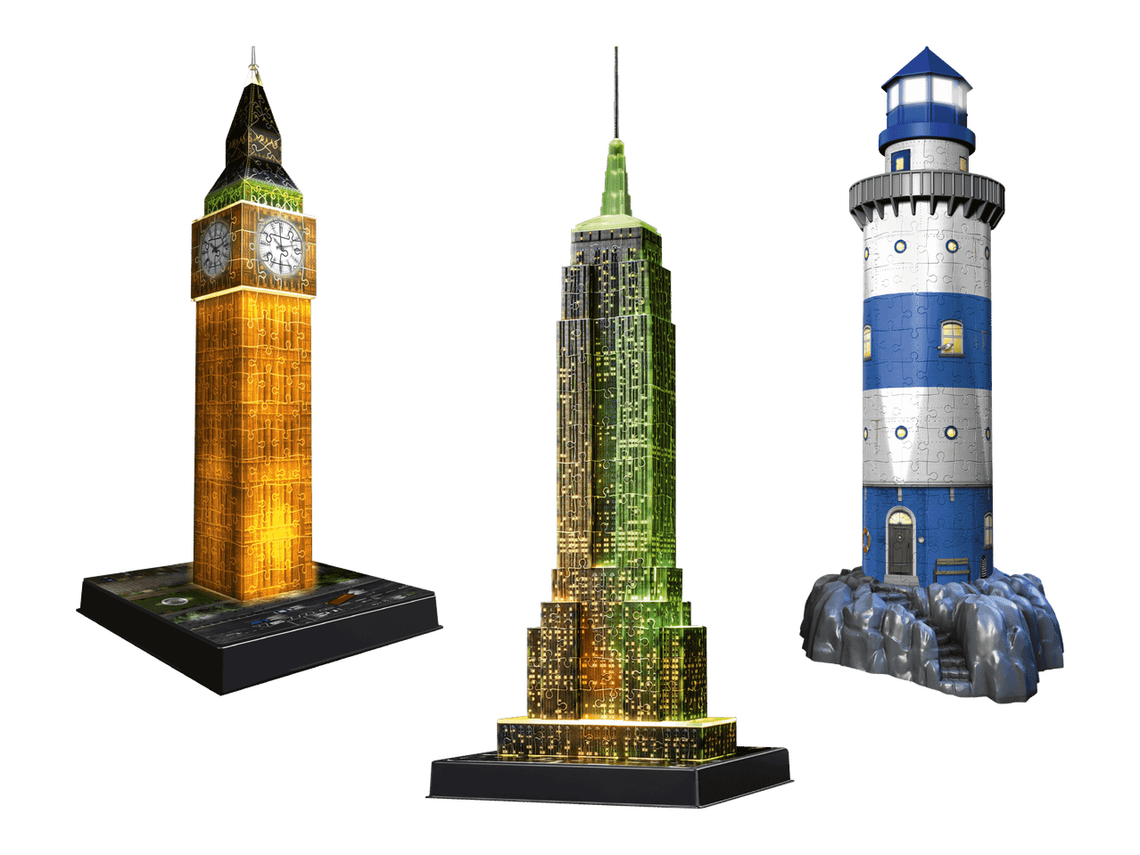 Kolme 3D-palapelirakennelmaa: Big Ben, Empire State Building ja majakka.