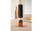 SILVERCREST® Electric Salt/Pepper Mill with mixed peppercorns on a kitchen counter.